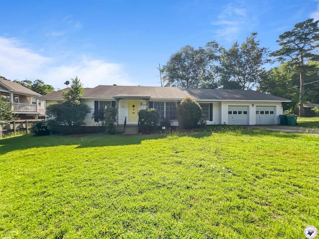 3223 Walnut St, Texarkana, TX 75503 - ranch-style house with a front yard, an attached garage, and driveway