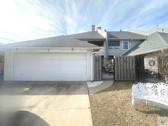 view of front of property featuring a garage