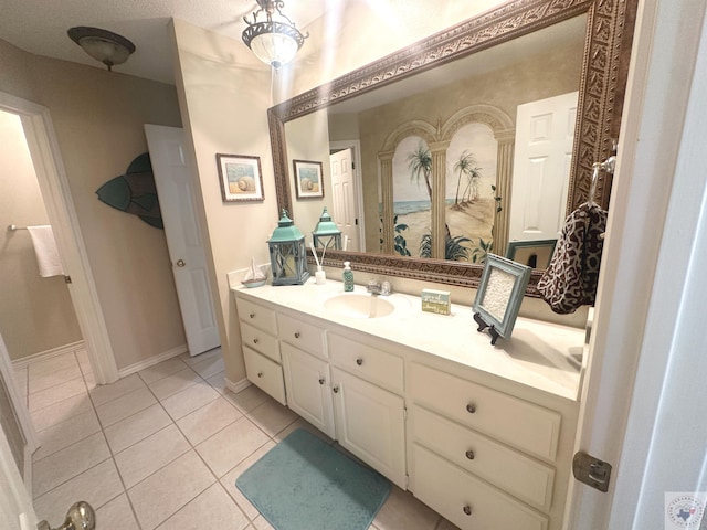 bathroom featuring tile patterned floors and vanity