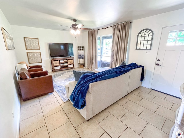 9 Camelia Ln, Texarkana, TX 75503 - living room with light tile patterned floors, plenty of natural light, and a ceiling fan