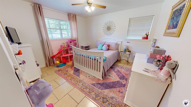9 Camelia Ln, Texarkana, TX 75503 - bedroom with light tile patterned flooring and a ceiling fan