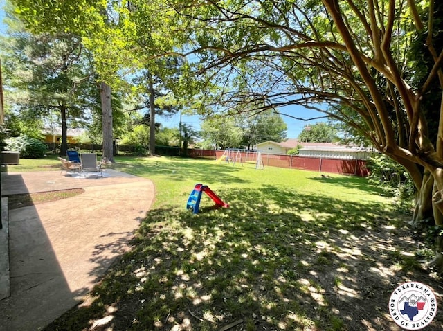 9 Camelia Ln, Texarkana, TX 75503 - view of yard with a playground and a patio