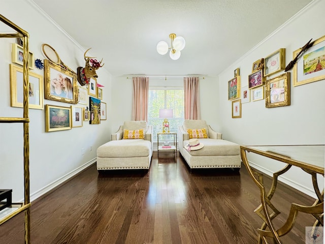 living area with dark hardwood / wood-style floors and ornamental molding