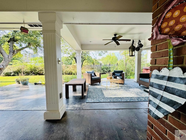 view of patio featuring ceiling fan and outdoor lounge area