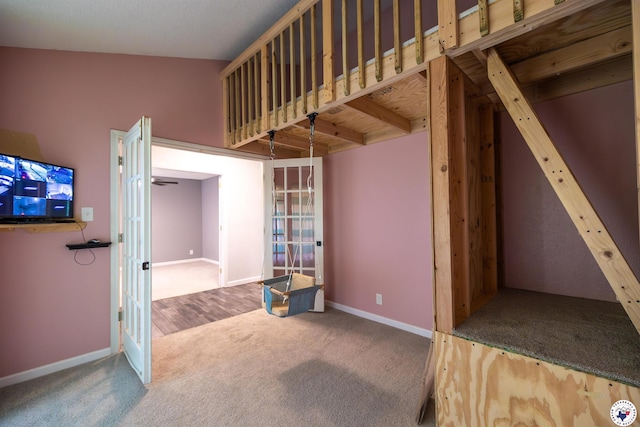 interior space featuring french doors, baseboards, and carpet
