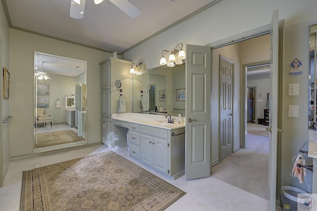 bathroom with vanity, tile patterned floors, ceiling fan, and ornamental molding