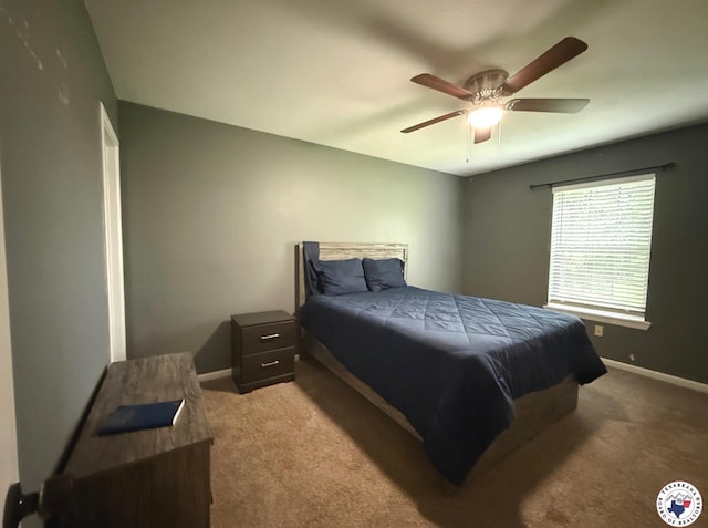202 Mehaffey Dr, Dekalb, TX 75559 - bedroom featuring light colored carpet, baseboards, and ceiling fan