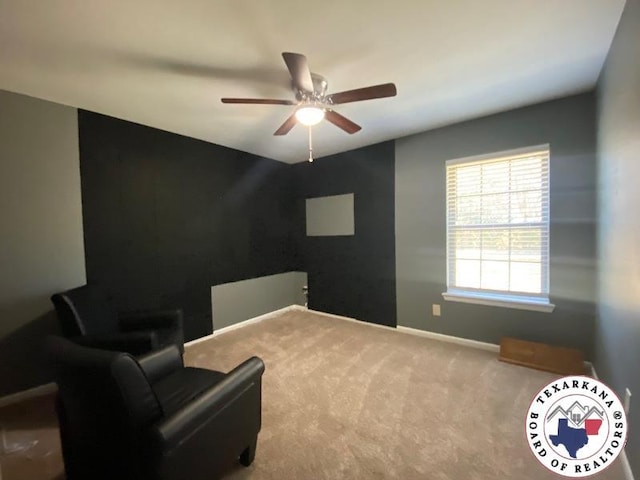 202 Mehaffey Dr, Dekalb, TX 75559 - living area with a ceiling fan, carpet flooring, and baseboards