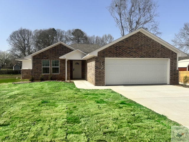 110 Village Pl, Wake Village, TX 75501 - single story home with concrete driveway, a front yard, brick siding, and a garage
