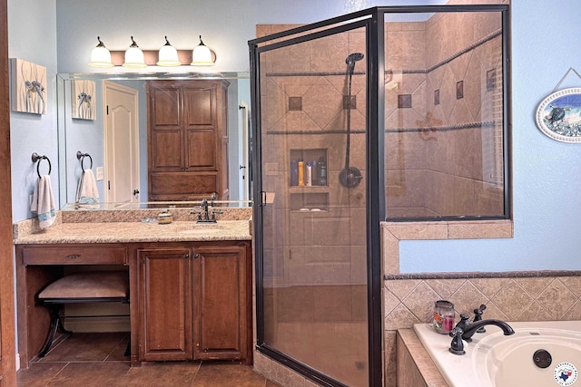 7 Coppercreek Cir, Texarkana, TX 75503 - bathroom with a bath, a shower stall, and tile patterned floors