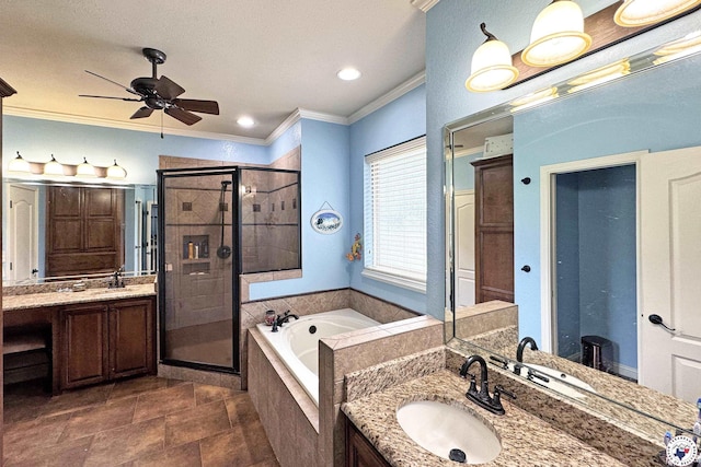 7 Coppercreek Cir, Texarkana, TX 75503 - full bathroom featuring a stall shower, crown molding, a garden tub, ceiling fan, and two vanities