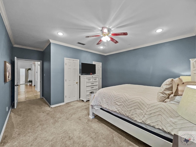 bedroom with ceiling fan, light colored carpet, and crown molding