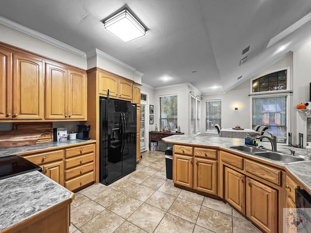 kitchen with vaulted ceiling, sink, ornamental molding, light tile patterned flooring, and black fridge with ice dispenser