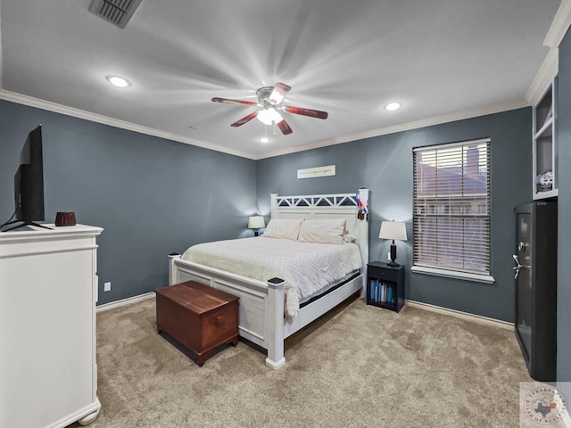 carpeted bedroom featuring ceiling fan and ornamental molding