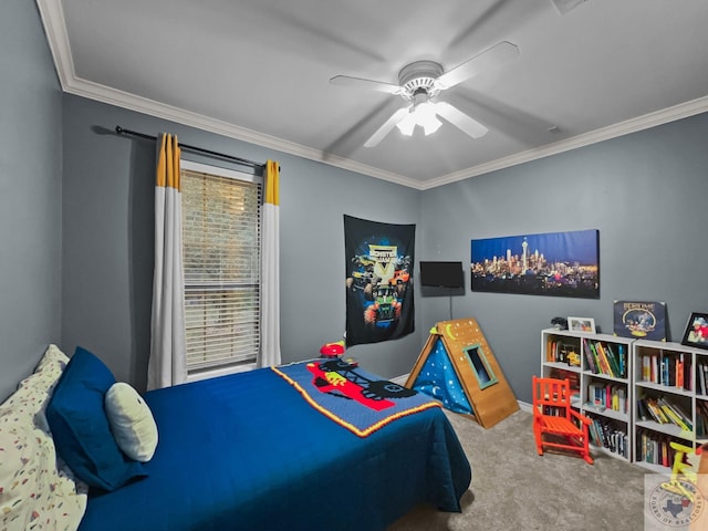 carpeted bedroom featuring ceiling fan and crown molding