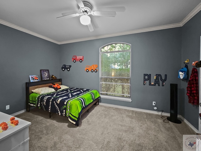 carpeted bedroom with ceiling fan and ornamental molding