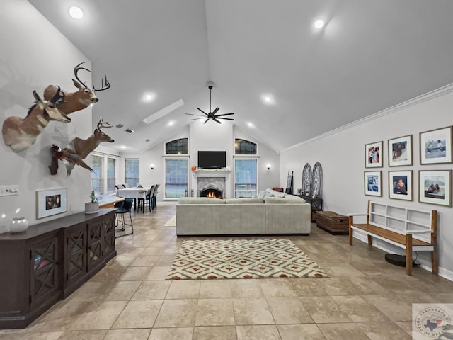 tiled living room featuring ceiling fan, high vaulted ceiling, and crown molding