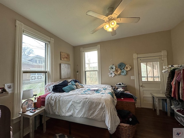 bedroom featuring dark hardwood / wood-style floors and ceiling fan