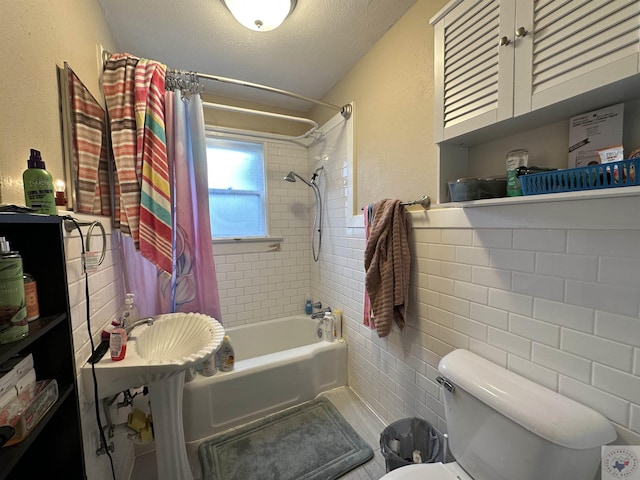 bathroom with toilet, a textured ceiling, tile walls, shower / bath combination with curtain, and backsplash