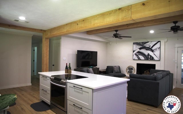 206 Oak St, New Boston, TX 75570 - kitchen with electric stove, ceiling fan, open floor plan, and recessed lighting