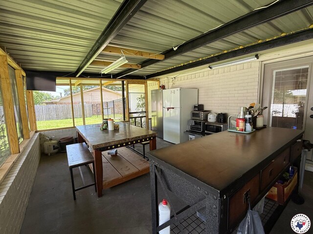 206 Oak St, New Boston, TX 75570 - sunroom / solarium with outdoor dining space