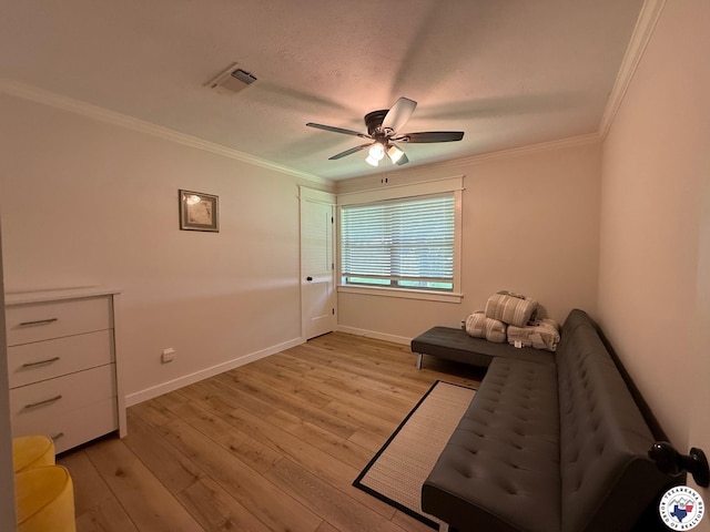 206 Oak St, New Boston, TX 75570 - living area featuring ornamental molding, light wood-style floors, a ceiling fan, and baseboards
