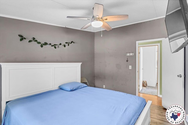 2520 County Road 326, W, TX 75706 - bedroom with light wood-style flooring, ceiling fan, and ornamental molding