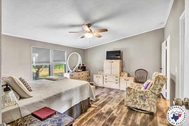 2520 County Road 326, W, TX 75706 - bedroom with crown molding, wood finished floors, and a ceiling fan