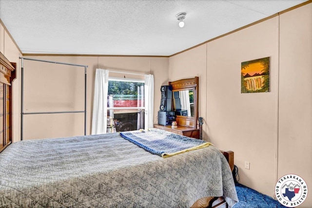 2520 County Road 326, W, TX 75706 - carpeted bedroom with crown molding and a textured ceiling