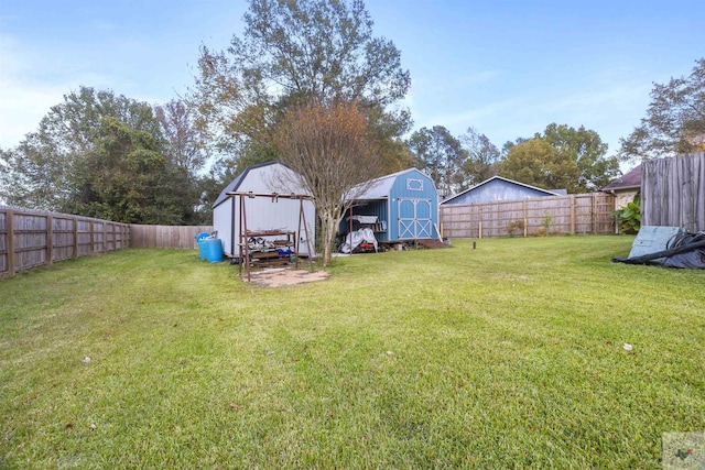 view of yard with a storage unit