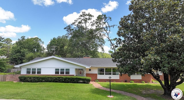 1302 Canadian St, Texarkana, TX 75503 - ranch-style house featuring a front lawn, brick siding, and roof with shingles