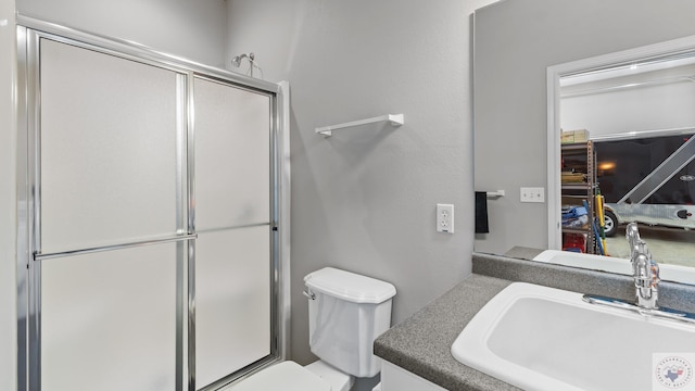 7207 N Richland Dr, Texarkana, TX 75503 - full bath featuring toilet, vanity, and a shower with shower door