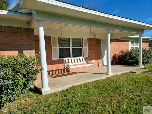 exterior space featuring covered porch