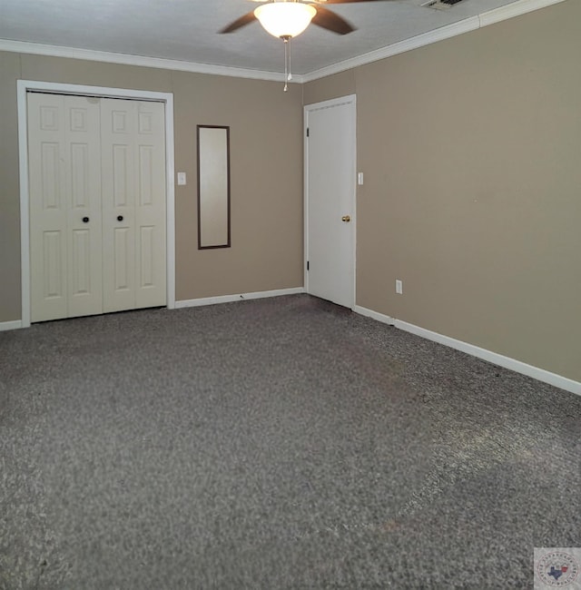 unfurnished bedroom with a closet, ceiling fan, ornamental molding, and carpet floors