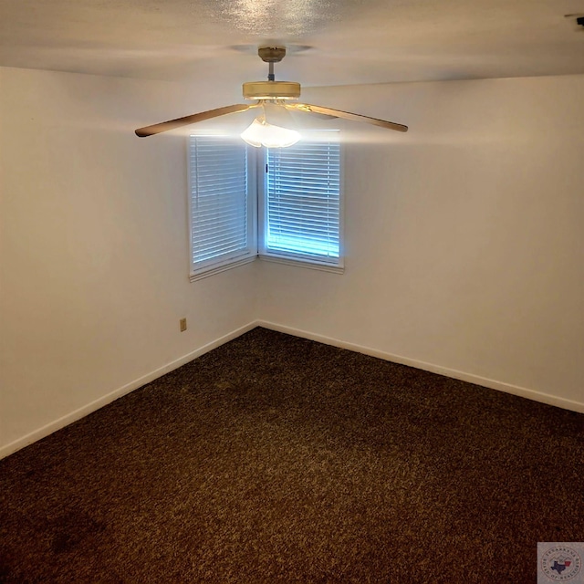 unfurnished room featuring carpet floors, a textured ceiling, and ceiling fan