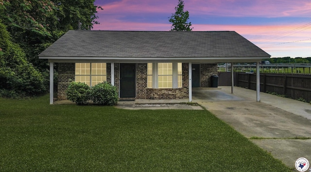 909 Pacific Ave, Wake Village, TX 75501 - ranch-style home featuring driveway, brick siding, an attached carport, and roof with shingles