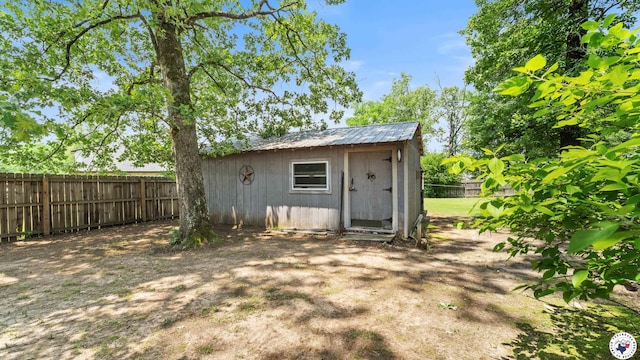 9216 W 7th St, Redwater, TX 75501 - view of shed with a fenced backyard
