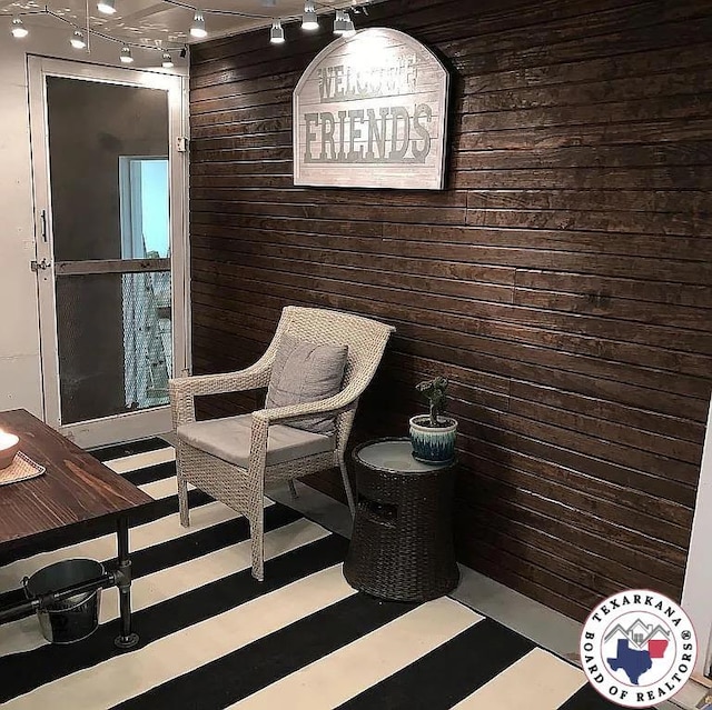 9216 W 7th St, Redwater, TX 75501 - sitting room with wooden walls and rail lighting