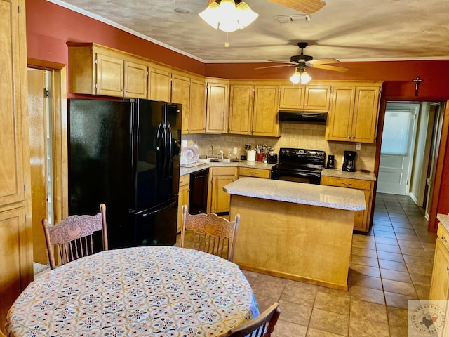 kitchen with black appliances, exhaust hood, decorative backsplash, sink, and a kitchen island