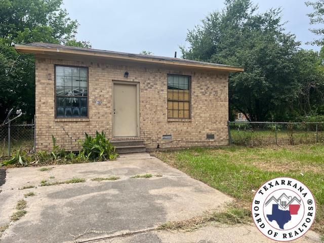 503 Cannon St, New Boston, TX 75570 - view of front facade with entry steps, brick siding, and crawl space