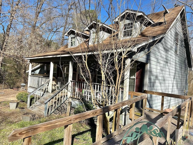 view of home's exterior with covered porch