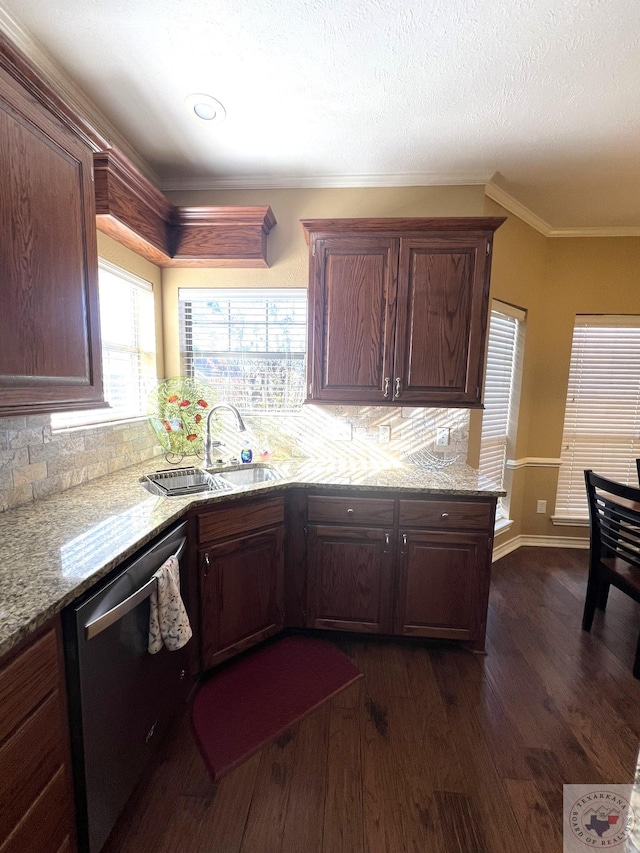 kitchen with backsplash, dark hardwood / wood-style floors, dishwasher, and ornamental molding