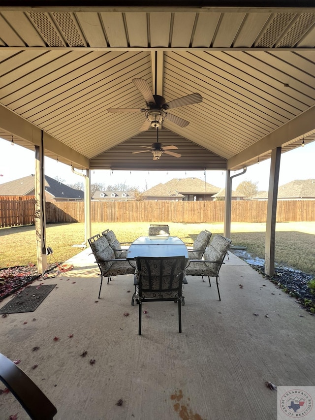 view of patio / terrace with a mountain view and ceiling fan