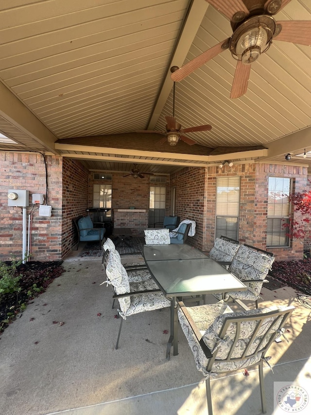 view of patio featuring ceiling fan