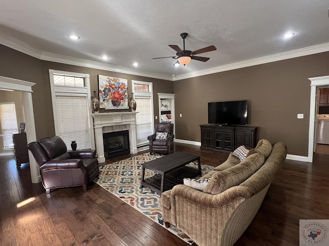 living room with ceiling fan, crown molding, and dark hardwood / wood-style flooring