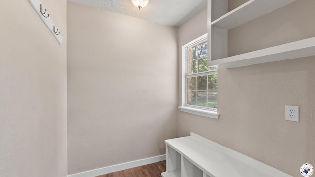 1911 Vanderbilt Rd, Texarkana, AR 71854 - mudroom featuring baseboards and wood finished floors