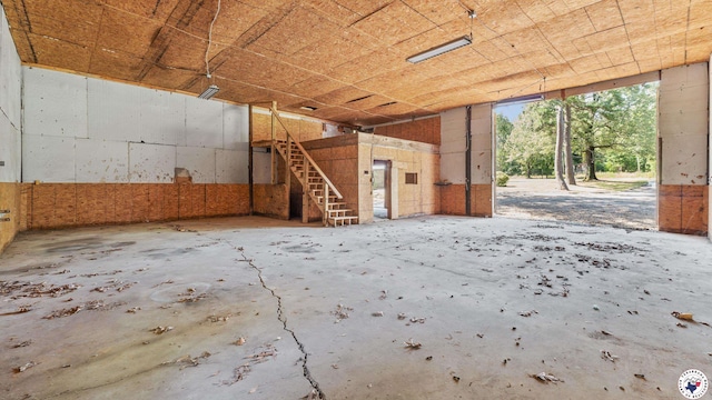 1911 Vanderbilt Rd, Texarkana, AR 71854 - miscellaneous room featuring unfinished concrete floors