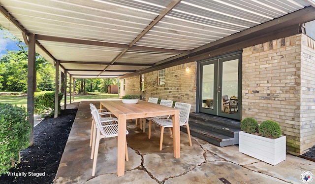 1911 Vanderbilt Rd, Texarkana, AR 71854 - view of patio / terrace with french doors and outdoor dining area