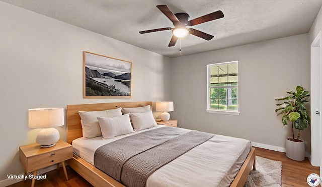 1911 Vanderbilt Rd, Texarkana, AR 71854 - bedroom featuring wood finished floors and ceiling fan