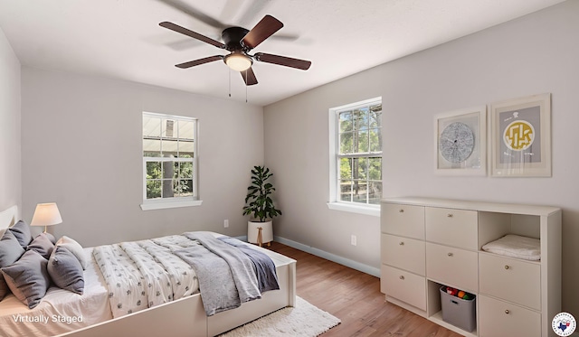 1911 Vanderbilt Rd, Texarkana, AR 71854 - bedroom featuring light wood-style floors and a ceiling fan